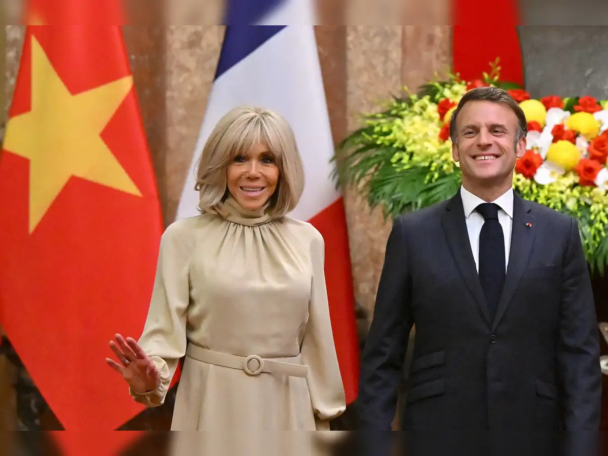 Brigitte Macron’s Playful Gesture Sparks Viral Frenzy as President Calls for Calm and Context